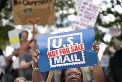New U.S. Postal Service head says he doesn't believe in privatizing the mail agency