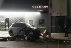 After plowing his car into a crowd outside an LA nightclub, the driver was beaten and shot by bystanders, police say